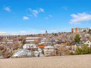 Drone / aerial view featuring a residential view and a mountain view