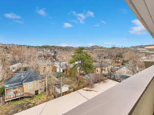 Property view of mountains with a residential view