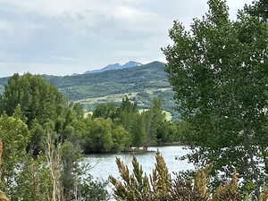 Mountain view featuring a large body of water