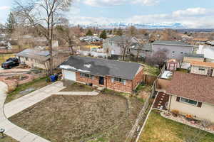 Aerial view featuring a residential view and a mountain view