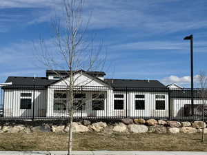 View of front of property with fence