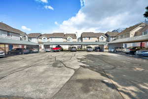 Covered parking lot with a residential view