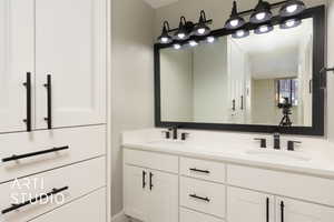 Bathroom with double vanity and a sink