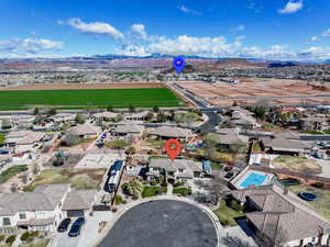 Drone / aerial view featuring a mountain view and a residential view