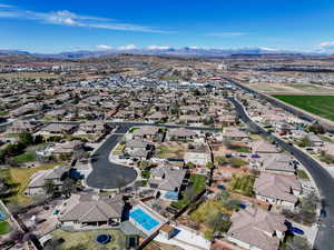 Birds eye view of property with a residential view and a mountain view