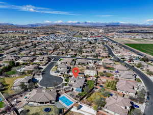 Aerial view featuring a mountain view and a residential view