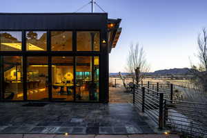 Exterior space featuring a mountain view and fence