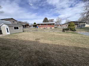 View of yard with fence