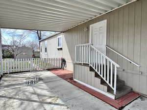 View of main door entrance from carport