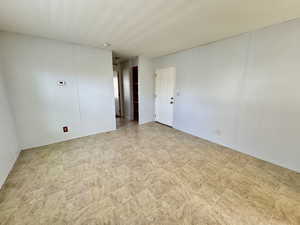 Open living space with view of main front door entrance
