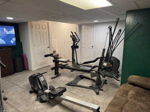 Workout room with a drop ceiling