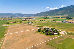 Drone / aerial view featuring a mountain view and a rural view
