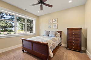 Carpeted bedroom with visible vents, recessed lighting, baseboards, and ceiling fan