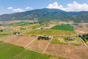 Aerial view with a mountain view and a rural view