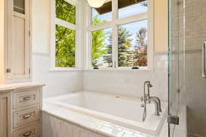 Full bathroom with a bath