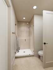 Rendering of Bathroom with a shower stall and recessed lighting