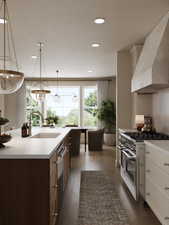 Rendering of Kitchen with premium range hood, appliances with stainless steel finishes, healthy amount of natural light, light countertops, and recessed lighting