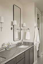 Bathroom featuring double vanity