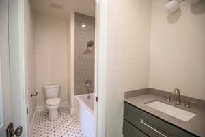 Full bathroom with bathing tub / shower combination and vanity