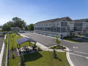 View of parking featuring a residential view