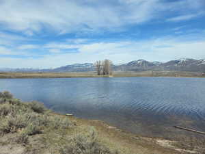 Property view of water featuring a mountain view