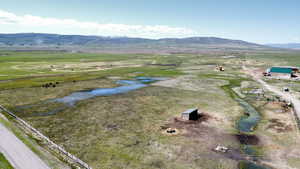 Aerial view of sparsely populated area with mountains