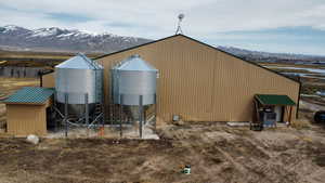 View of pole building featuring central AC and a mountain view