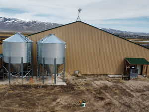 View of pole building featuring central AC and a mountain view