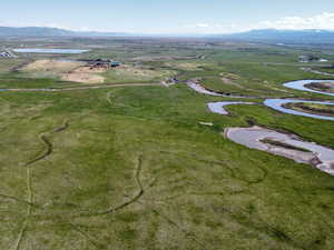 View of property location with a water and mountain view