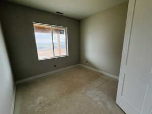 Empty room with baseboards