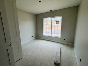 Empty room with baseboards