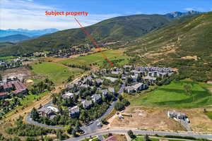 Drone / aerial view featuring a residential view and a mountain view