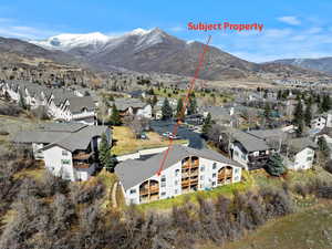 Drone / aerial view featuring a residential view and a mountain view