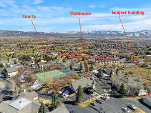 Aerial view featuring a residential view and a mountain view