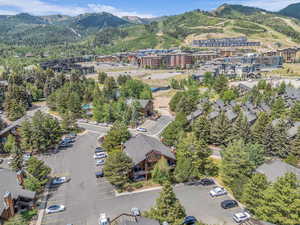 Aerial view of property's location with mountains