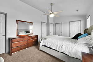 Carpeted primary bedroom