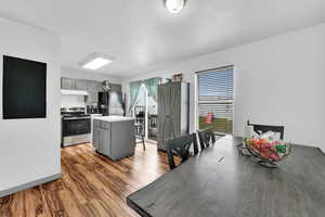 Dining space with dark floors
