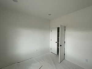 Unfurnished room featuring concrete floors