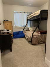 ADU Carpeted bedroom with visible vents