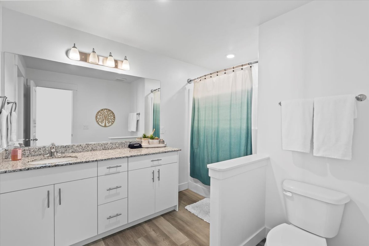 large primary bathroom with walk in closet