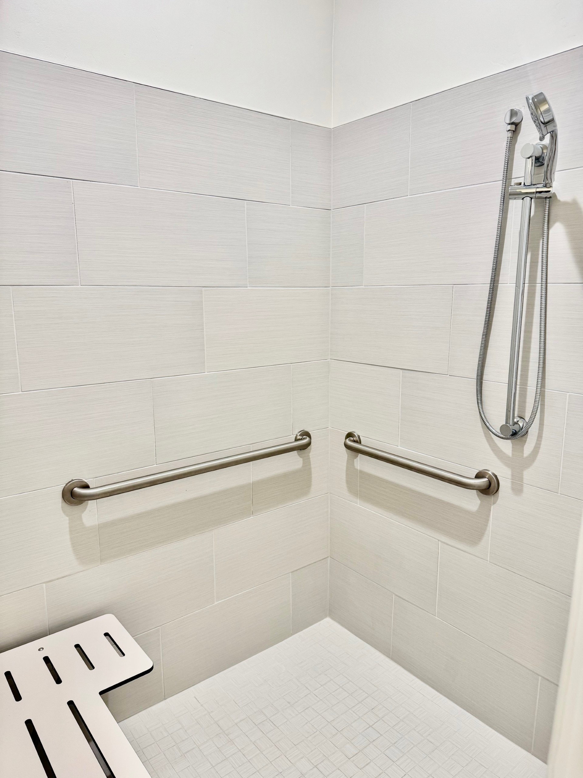 both bathrooms include a shower