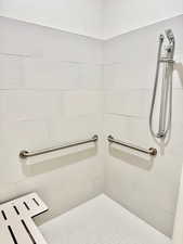 both bathrooms include a shower