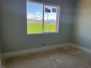 Empty room with baseboards