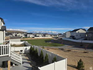 View of yard featuring a residential view and a fenced backyard