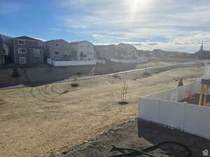 Property view of mountains featuring a residential view