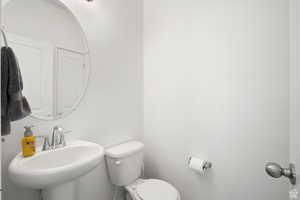 Bathroom featuring a sink and toilet