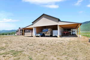 View of outdoor structure featuring a mountain view