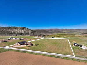 View of mountain background featuring rural landscape