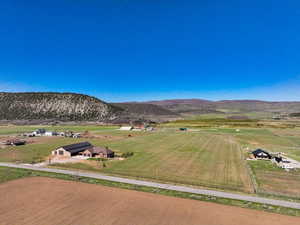 Drone / aerial view featuring a rural view and a mountain view