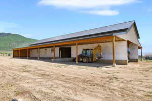 Garage featuring a mountain view